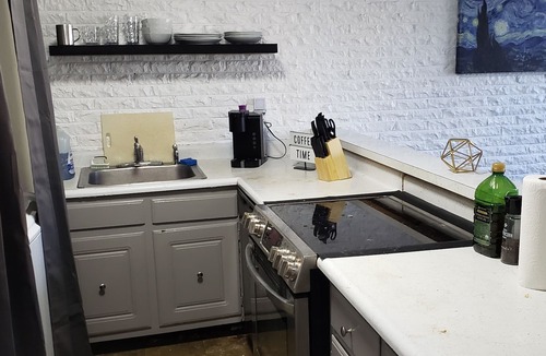 Vandalia Apartment | 1000sq ft with King Beds and a Bear Table