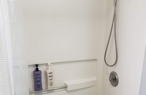 Vandalia Apartment | 1000sq ft with King Beds and a Bear Table