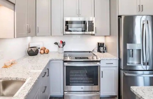 Central Business District Condo | 1208 Commerce St. #104