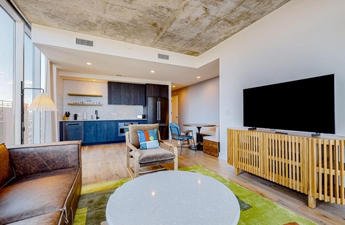 Rainey Street Historic District Condo | 13th floor corner condo, lake-view balcony, rooftop pool & gym, dog-friendly