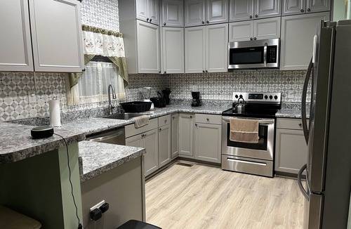 Sutherland House | 1400 Square feet of space, isolate in three acres lot.