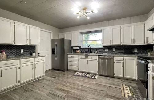 Owasso House | 15 minutes to the airport. A peaceful nest in the middle of the city.