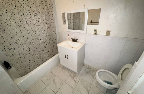 Hyde Square House | 184 Heath St