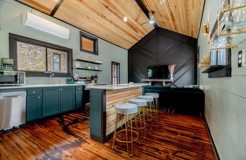 Holiday Island Cabin | 1870 Luxury Art Deco Train Depot at the Lake