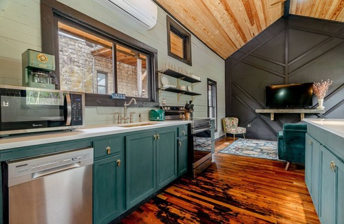 Holiday Island Cabin | 1870 Luxury Art Deco Train Depot at the Lake