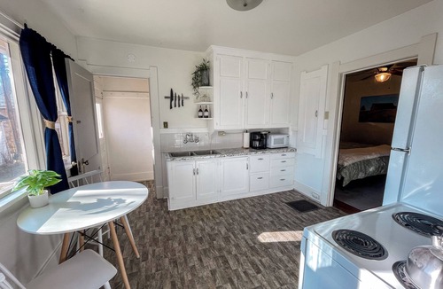 Laramie Apartment | 1920s Home for Extended Stays. Pet-Friendly and Extra Spaces!