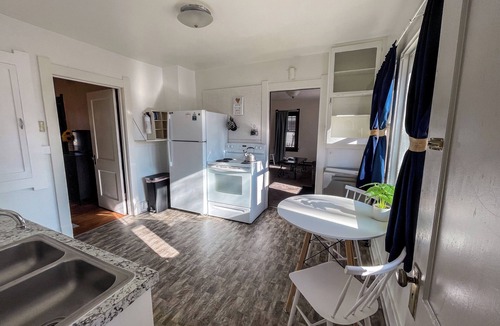 Laramie Apartment | 1920s Home for Extended Stays. Pet-Friendly and Extra Spaces!