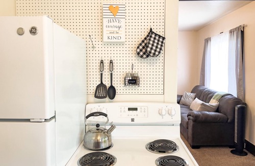 Laramie Apartment | 1920s Home for Extended Stays. Pet-Friendly and Extra Spaces!