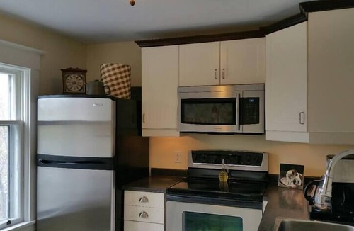 North End Apartment | 1930's Nostalgic Boutique Loft Canopy Beds