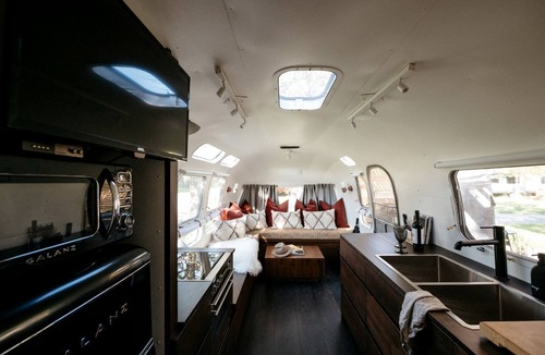 Tyendinaga Mohawk Territory House | 1971 Vintage Modern Airstream with Cowboy Tub
