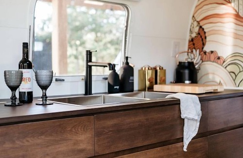 Tyendinaga Mohawk Territory House | 1971 Vintage Modern Airstream with Cowboy Tub