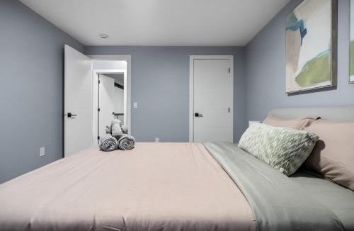 Airdrie Apartment | 1BR Entertainment Space Projector and Games Room