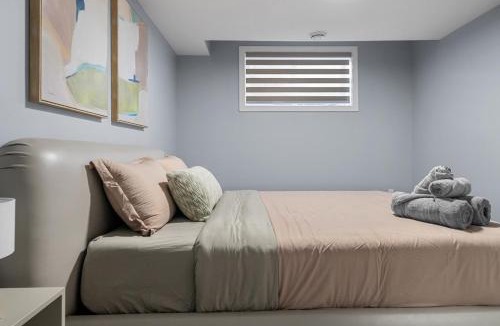Airdrie Apartment | 1BR Entertainment Space Projector and Games Room