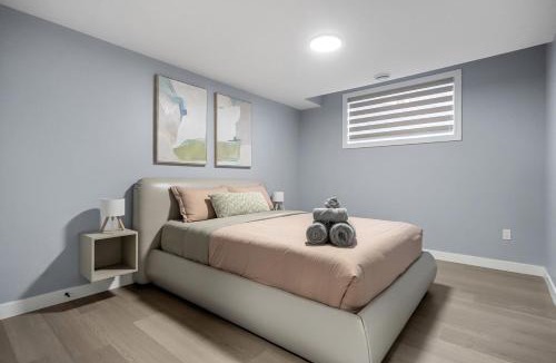 Airdrie Apartment | 1BR Entertainment Space Projector and Games Room