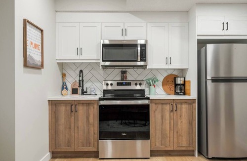 Southeast Calgary House | 1BR Lower Level Suite with Secure Entry & Laundry