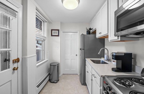 Salem Apartment | 1BR on Salem Common l Steps to Witch Museum l Fenced in Yard + Parking