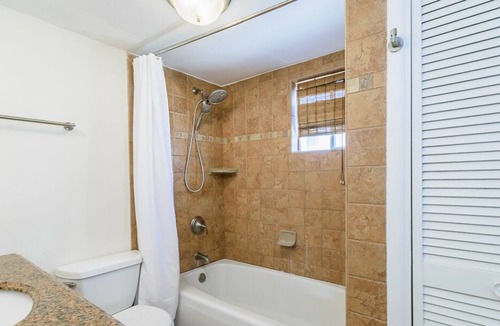 Neptune Beach House | 2 Bedroom 1 Bath Duplex Just steps from the beach with a Pool