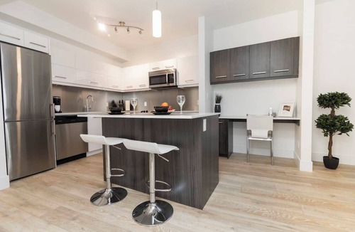 Saskatoon Downtown Apartment | 2-bedroom apartment in serene Saskatoon with cool AC and complimentary gym