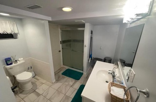 Round Lake Beach House | 2-Bedroom Basement Suite