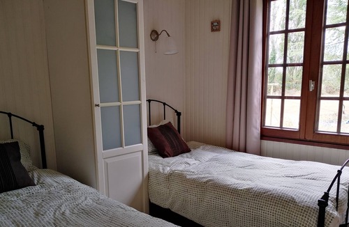 Aubigne-Racan Ski Chalet | 2 bedroom Chalet set in 3 1/2 acres overlooking a tranquil ornamental lake