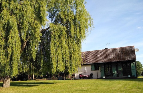 Aubigne-Racan Ski Chalet | 2 bedroom Chalet set in 3 1/2 acres overlooking a tranquil ornamental lake