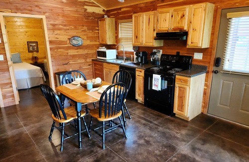 Swinging Bridge Village Cabin | 2 Bedroom Little Red Riverfront Cabin on Winkley Shoals