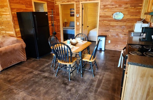 Swinging Bridge Village Cabin | 2 Bedroom Little Red Riverfront Cabin on Winkley Shoals