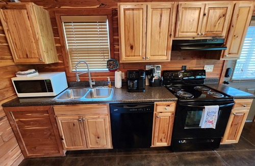 Swinging Bridge Village Cabin | 2 Bedroom Little Red Riverfront Cabin on Winkley Shoals
