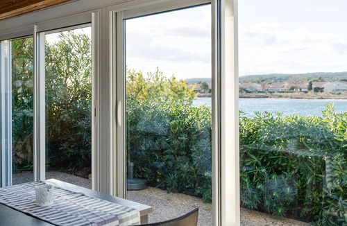 Les Ayguades Villa | 2-Bedroom Pavilion with Mezzanine and WIFI - Pets Allowed, Lagoon View