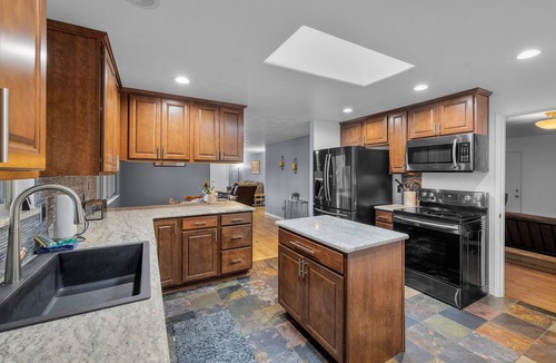 Southeast Bend Condo | 2 Bedrooms, Private Hot Tub, Media Room, Dog friendly with Yard Space.
