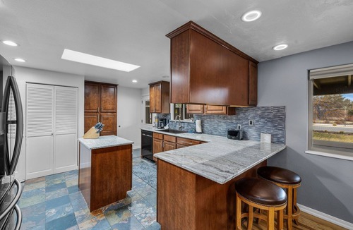 Southeast Bend Condo | 2 Bedrooms, Private Hot Tub, Media Room, Dog friendly with Yard Space.
