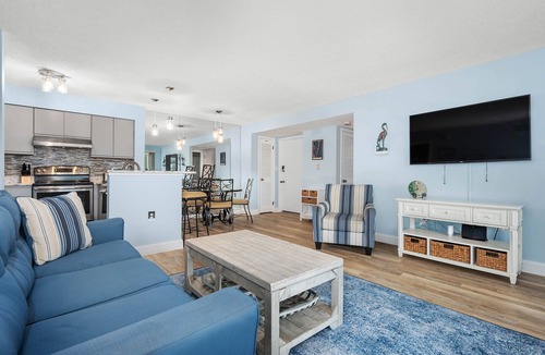 Heron Harbour Isle Condo | 2 BR Waterfront Condo w/pool! 1st floor, Patio, W/D, 10-min walk to the beach