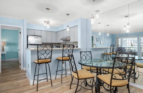 Heron Harbour Isle Condo | 2 BR Waterfront Condo w/pool! 1st floor, Patio, W/D, 10-min walk to the beach