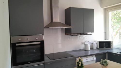 Saint-Martin Hotel | 2 Chambres, 4 personnes, jardin, proche centre ville