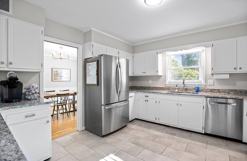 Greensboro House | 2 Kitchens 3 Living Spaces Perfect for Groups Basketball Goal Fire Pit