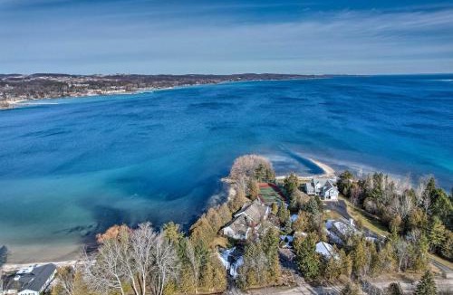 Suttons Bay House | 2 Living Areas, Tennis! Waterfront Suttons Bay Gem