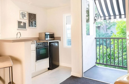 Norma Triangle Hotel | 2 Modern & Spacious Units w/City View! Rooftop Pool & Bar | Pet Friendly!