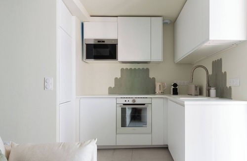 Bagneres-de-Bigorre Apartment | 2-room architect-designed apartment with covered balcony facing the spa