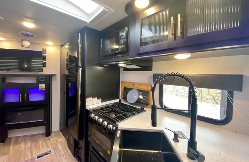 Talent House | 2 separate RV’s with queen-sized beds, dining area, and full kitchen.
