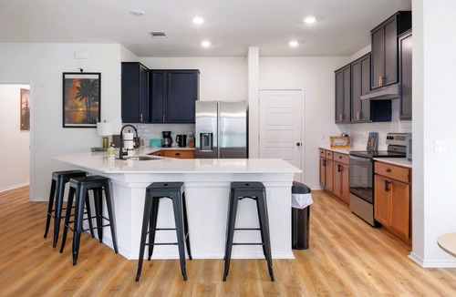 McNeil House | 20 Mins to COTA | Modern 3BR Retreat + EV Parking