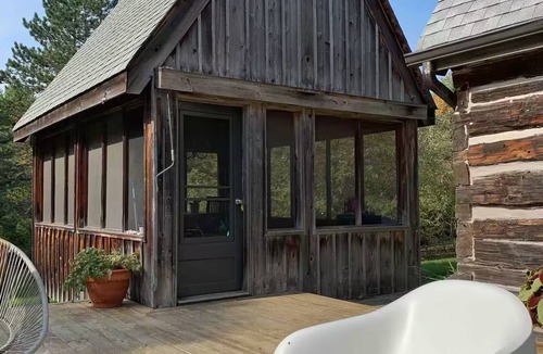 Newcastle Cabin | 200 year-old modern log cabin on 40 acres with hot tub & nearby ski hill