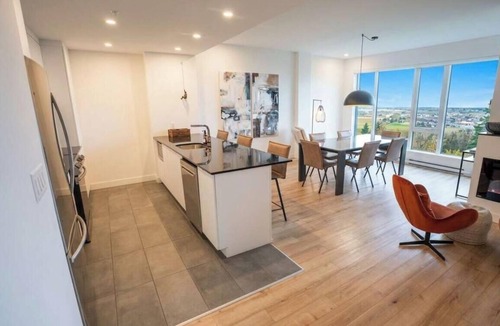 Baie-St-Paul Apartment | 205 - Modern Suite - Pool and River View