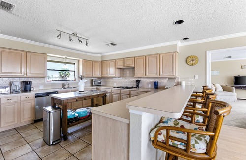 Jamaica Beach House | 22 Palms: Canalfront Home with Pool, Kayaks & Beach Toys