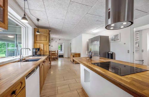 Karup House | 24 person pool house with activity room and 8 bedrooms.