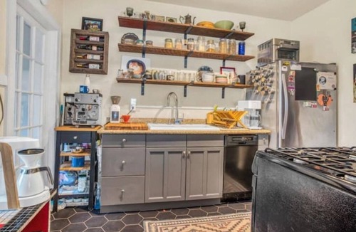 Concordia House | 2Bd Bungalow with backyard sauna, by Alberta Arts