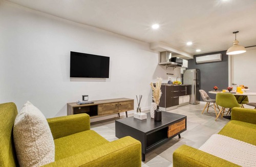 Centro Apartment | 2BR Apt w/Balcony: Gym, Rooftop+Fire Pit, Lounge/Games