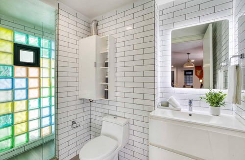 Centro Apartment | 2BR Apt w/Balcony: Gym, Rooftop+Fire Pit, Lounge/Games