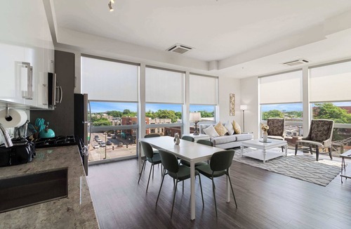 Palmer Square Apartment | 2BR City Loft Sweeping Glass Views