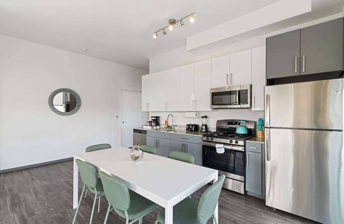 Palmer Square Apartment | 2BR City Loft Sweeping Glass Views