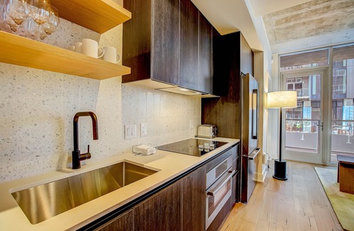 Rainey Street Historic District Condo | 2BR Condo near Rainey St | Heated Pool | Gym | Bar